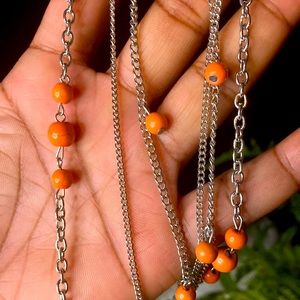 NWT! Orange Crackle and Silver Grab N Go Necklace w/matching earrings!